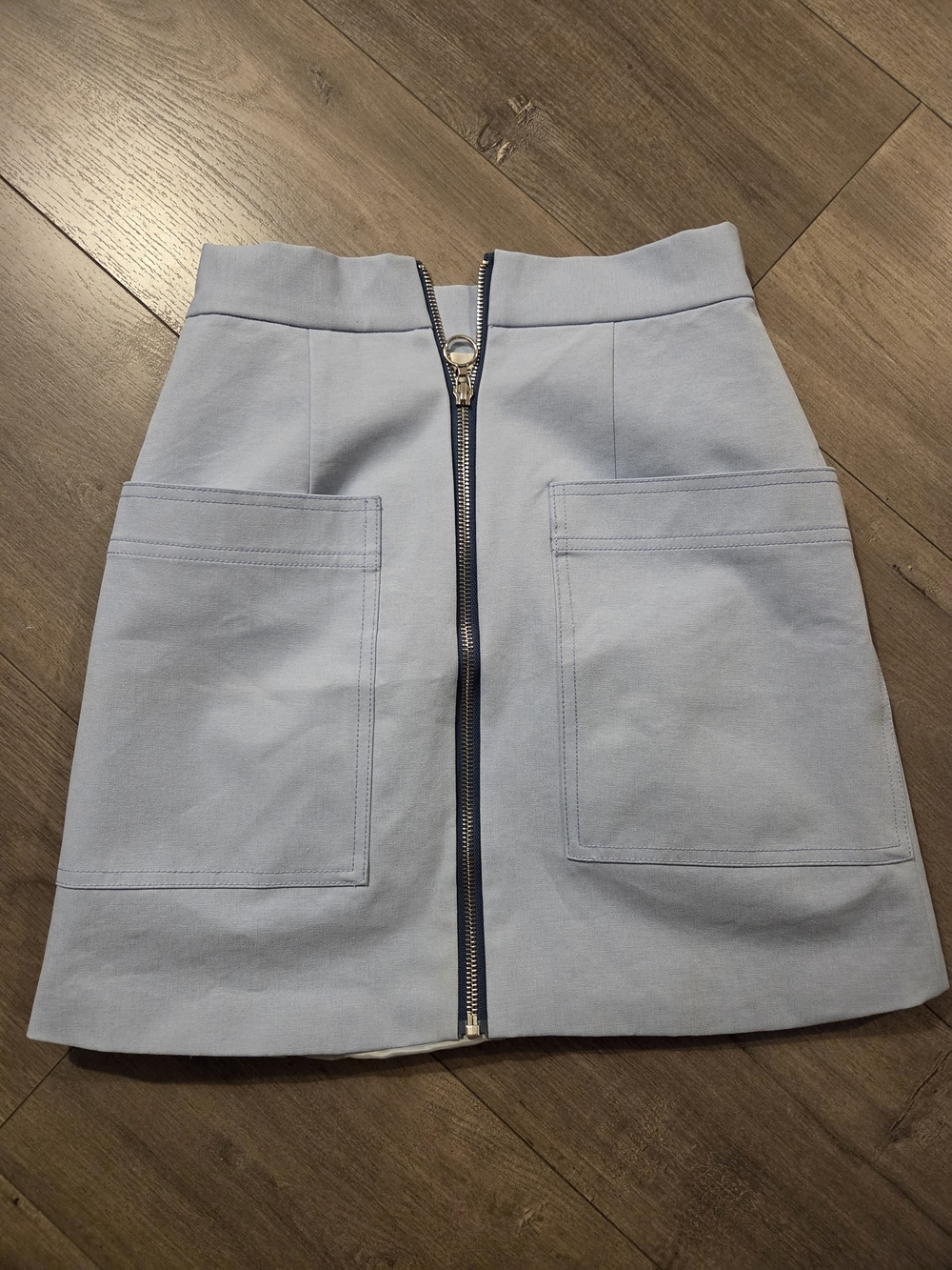 Light Blue Front-Zip Pocket Mini Skirt by (Cute And Unique)